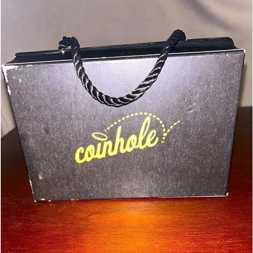 Coin hole game